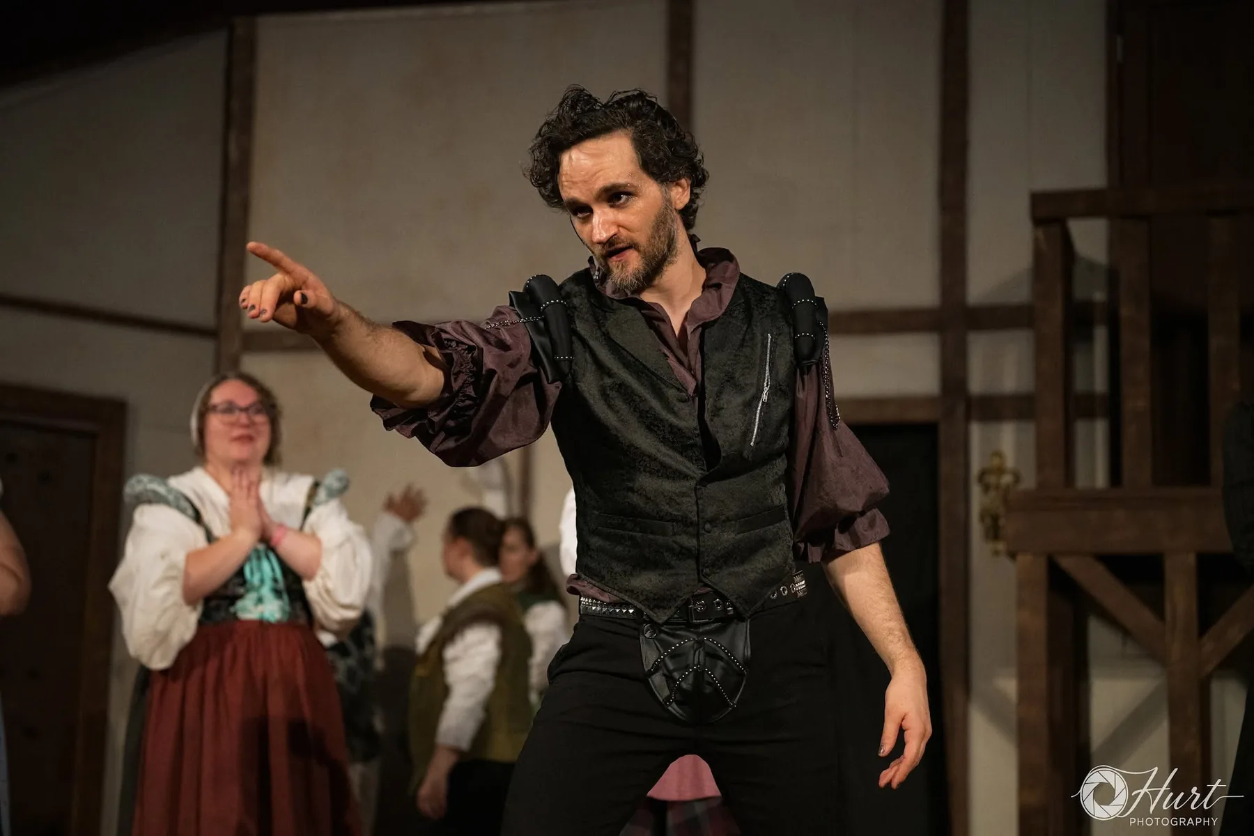 Jacques du Plessis performing onstage in Something Rotten
